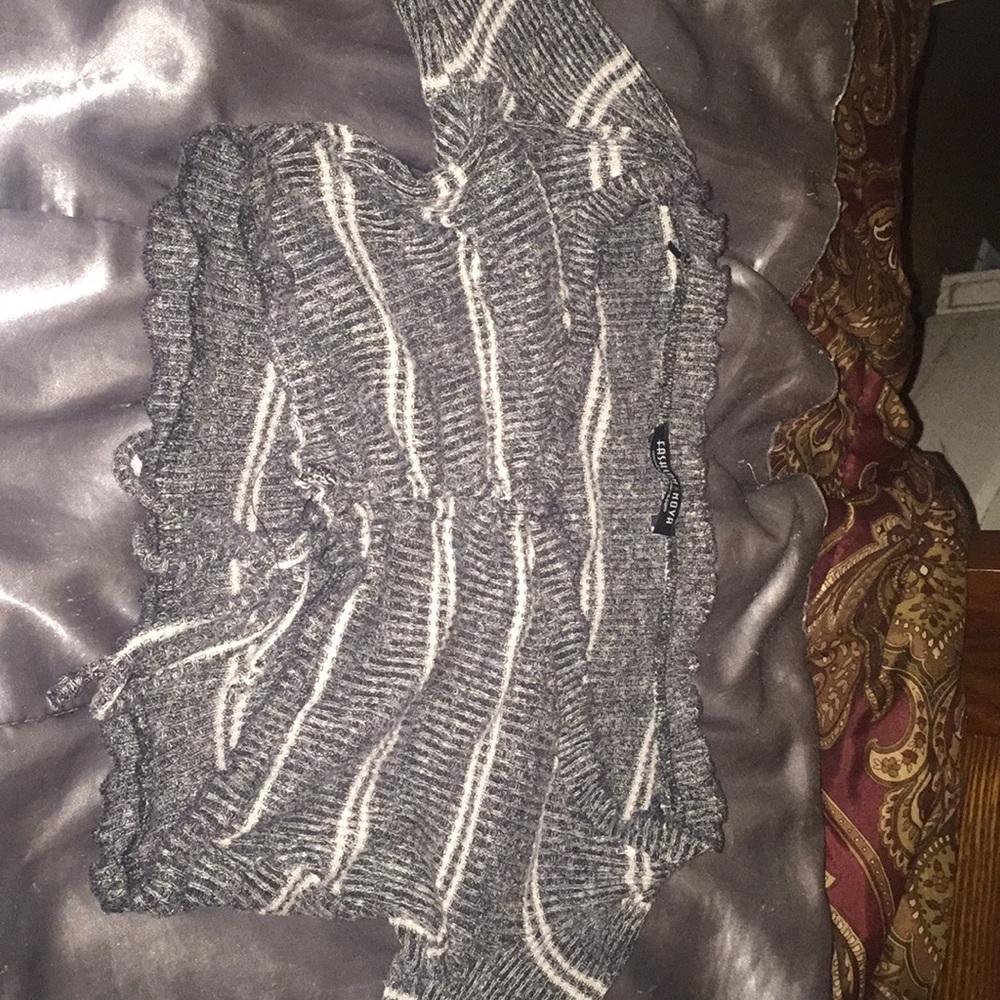 A grey and white stripped crop top 16.99 in store